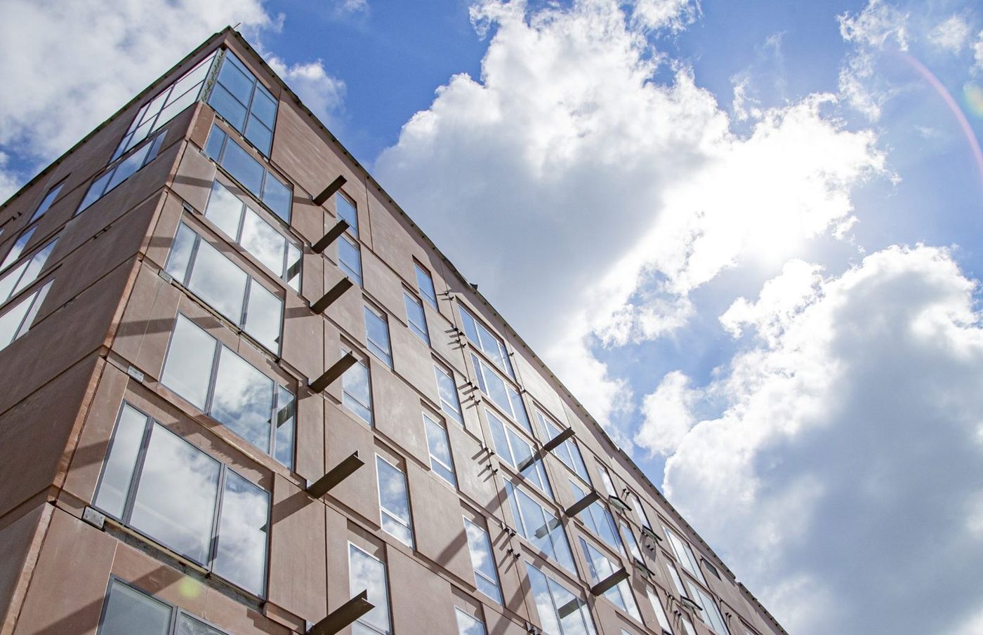 Industrial building facade against a blue sky