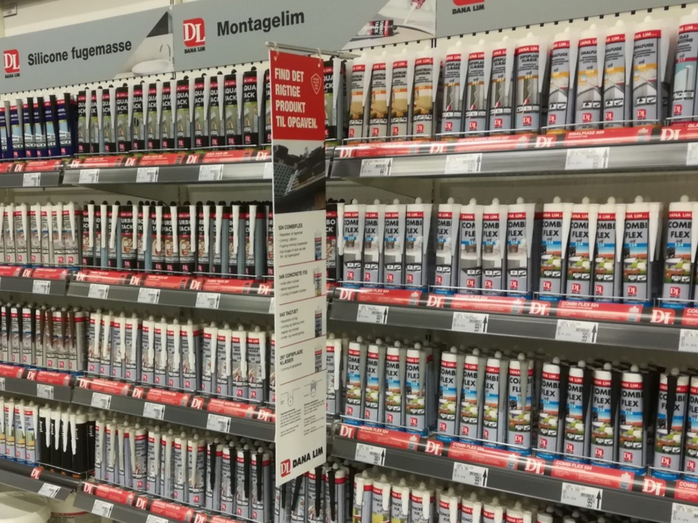 Dana Lim product shelf with sealants and assembly adhesives at a building merchant